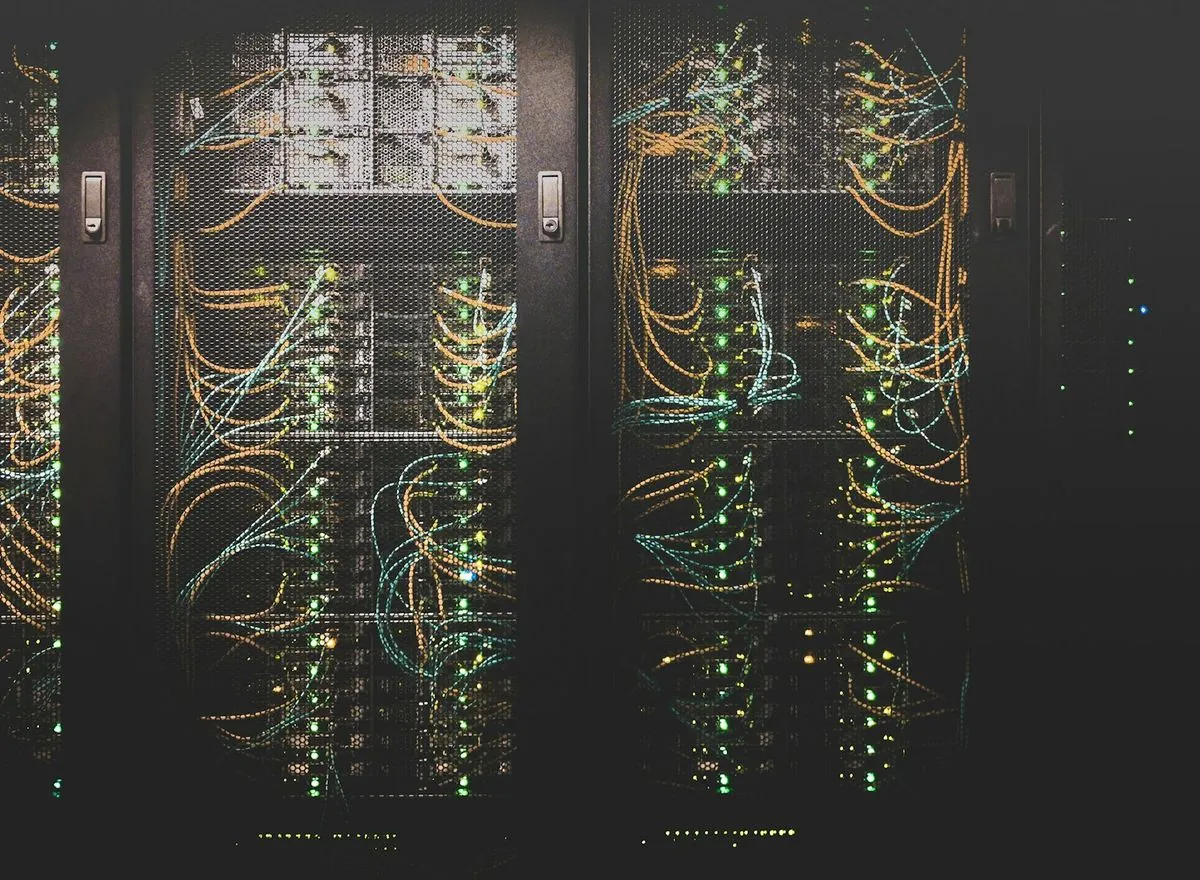 Rows of active server racks in a data center.